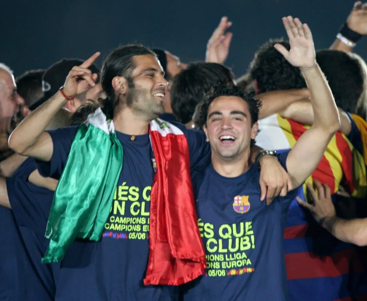 Márquez y Xavi durante el festejo por la UEFA Champions League conquistada ante el Arsenal