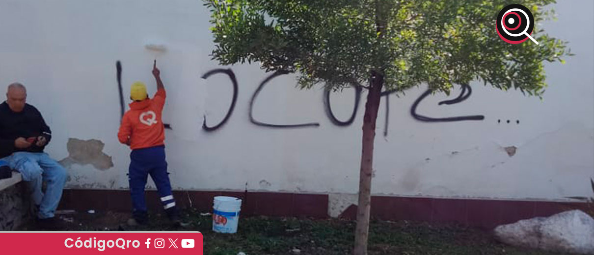 Limpian grafitis en bardas de la colonia Cimatario